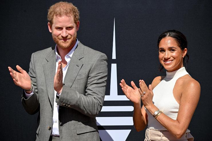 Harry e Meghan sorridenti